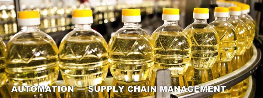 Bottles of Cooking Oil Filled and Capped on Assembly Line