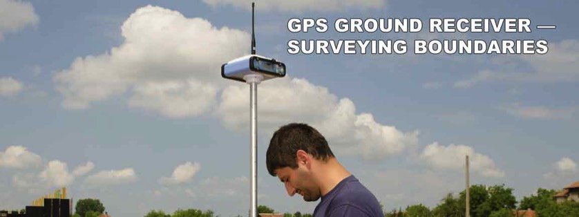 Man Using GPS Surveying Tool